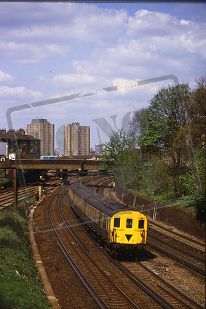 1105 (Cat No DEMUKM1105) Near Clapham Junction. On down fast, 66 working from Victoria to East Grinstead we think