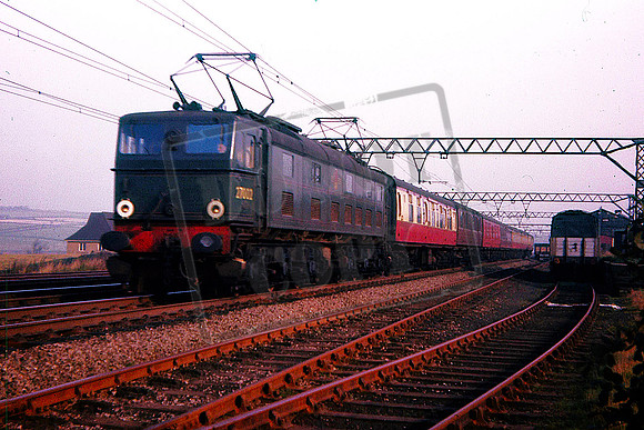 27002 (Cat No UNE27002) Penistone West Goods on Harwich boat train bound for Manchester. C1958
