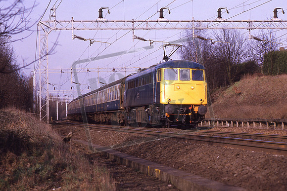 85029 (Cat No KMM85029B) 11.31 Northampton - Euston 1A22 Hunton Bridge 07-02-1987 Ken Moseley C0447
