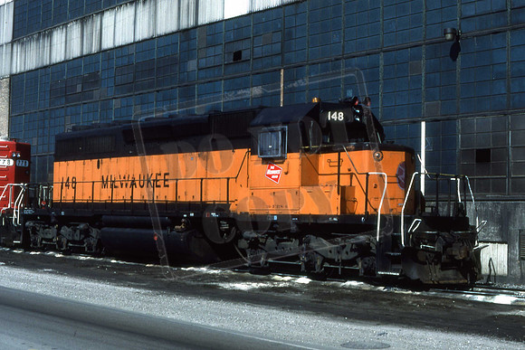 148 SD40-2 MIL148 MILWAUKEE ROAD. At Bensenville, IL. 08-03-87 Jon C Benson