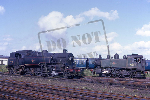 80152 & 30064 (Cat No UNS80152) Riddles 2-6-4T & USA 0-6-0T at Eastleigh. June 1967