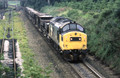 4-26 37175 (Cat No 4-26) Ballst for Inverurie station sidings passing Inverurie Paper Mill 20-07-90 Ian Ball