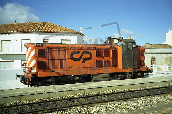 1419 POR AT TUNES  c2000
