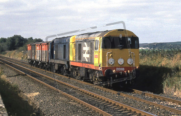 20118 & 20148 (Cat No 12-35) Approaching Thornton Junction at Cluny Bridge. VEA vans possibly for Rosyth Docks or more likely RNAD Crombie. 14-09-90 Ian Ball